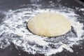 Dough on a black table, homemade food