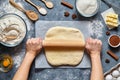 Dough bread, pizza or pie recipe homemade preparation. Female chef cook hands rolling with pin