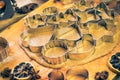 Dough cookie cutters Christmas gingerbread iced Kitchen table in Royalty Free Stock Photo