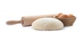 Dough, eggs and rolling pin on background. Cooking pastries