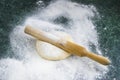 Dough on a floured marble green table, top view