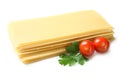 Dough for lasagna and tomatoes Royalty Free Stock Photo