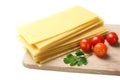 Dough for lasagna and tomatoes Royalty Free Stock Photo