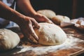 Dough mastery in action: male chef\'s hands create the foundation for delicious bread