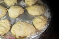 Dough pieces on a tray For further baking Royalty Free Stock Photo