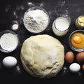 Dough for preparation bread, pizza, pie. Ingredients, food flat lay on kitchen table background. Butter, milk, yeast, flour, eggs Royalty Free Stock Photo