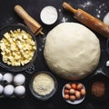 Dough for preparation bread, pizza, pie. Ingredients, food flat lay on kitchen table background. Butter, milk, yeast, flour, eggs Royalty Free Stock Photo