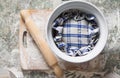 Dough rising covered with towel Royalty Free Stock Photo