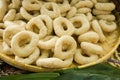 Doughnut donut close up with plain taste with white color with banana leaf and bamboo plate Royalty Free Stock Photo