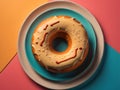 A doughnut with icing on top of a plate with a red and blue background