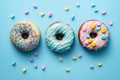 Doughnuts with blue glaze and sprinkles
