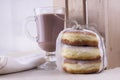 Doughnuts with glass of cacao