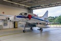 Douglas A-4 Skyhawk fighter jet plane from BAe Flight Systems parked in a shelter at Laage Air Base. Germany - August, 23 - 2014