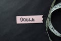 Doula write on sticky notes isolated on office desk Royalty Free Stock Photo
