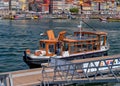 Douro River Taxi about to moor, Porto, Portugal.