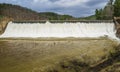 Douthat Lake Upper Dam at High Water - 3 Royalty Free Stock Photo