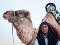 Douz, Tunisia, portrait of the camel and his camel driver