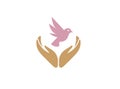 Dove bird between hands care human health and nature for logo design