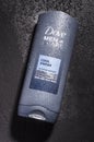 Dove body and face wash isolated on stone slate background. Dove is personal care brand owned by Unilever originating in UK Royalty Free Stock Photo