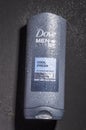 Dove body and face wash isolated on stone slate background. Dove is personal care brand owned by Unilever originating in UK