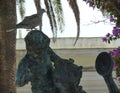 Dove sitting on the head of an ancient Greek statue Royalty Free Stock Photo