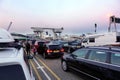 Dover, England - July 27 2018: Cars and vans at the ferry port in early morning, waiting to board the cross channel ferry boat