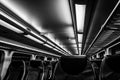 Dover, NJ USA - November 1, 2017: NJ Transit train at night with empty seats, black and white Royalty Free Stock Photo