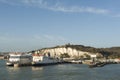 Port of Dover, with white cliffs and the Dover castle and two ferry ships of P&O lying Royalty Free Stock Photo