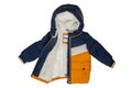 Down jacket for children. Stylish yellow blue cosy warm winter down jacket for kids isolated on a white background. Clipping path Royalty Free Stock Photo