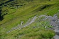 Down pathway from  First sumit Grindelwald to mountains valley.   Jungfrau region, Bern, Switzerland Royalty Free Stock Photo