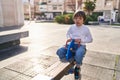 Down syndrome kid playing at park Royalty Free Stock Photo