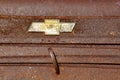 Chevrolet rusty logo on a truck grill