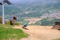 Downhill mountain bikers riding down the trail on Pohorje near Maribor, Slovenia Royalty Free Stock Photo