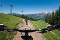 Downhill mountain biking on a shaped bike park trail in mountains of Austria