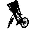 Downhill mountainbiker at the jump, mtb black silhouette. Royalty Free Stock Photo