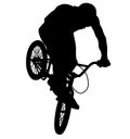 Downhill mountainbiker at the jump, mtb black silhouette. Royalty Free Stock Photo