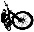 Downhill mountainbiker at the jump, mtb black silhouette. Royalty Free Stock Photo