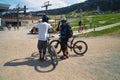 Downhill Mountainbikers Waiting Royalty Free Stock Photo