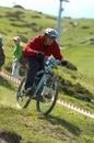 Downhill racer in red Royalty Free Stock Photo