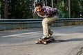 Downhill skateboarder in action