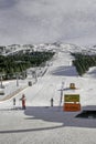 Bormio, Italy - January 31, 2005: Ski slope in Bormio with skier Royalty Free Stock Photo