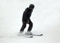 Downhill skier in black