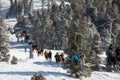 Downhill skiers on chairlift in mountains Royalty Free Stock Photo