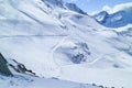 Downhill skiing slopes in snowy mountains, France, Alps