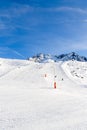 Downhill skiing, snow-capped mountains