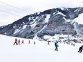 Downhill slope and apres ski and beautiful view of the Alps mountains Royalty Free Stock Photo