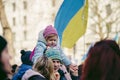 Young ukrainian children with flags gather to demand tougher sanctions on Russia from British Government to stop war in Ukraine