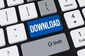 Download button on computer keyboard. Concept of file transfer, software update and digital information Royalty Free Stock Photo