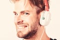 Download music application. Youth music taste. Student handsome guy listening music. Modern people concept. Man tousled