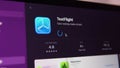 Downloading and installing TestFlight from the App Store on your MacBook.